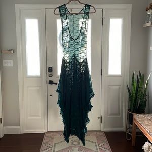 Free people dress. Size medium. Dark green lace. Worn once.